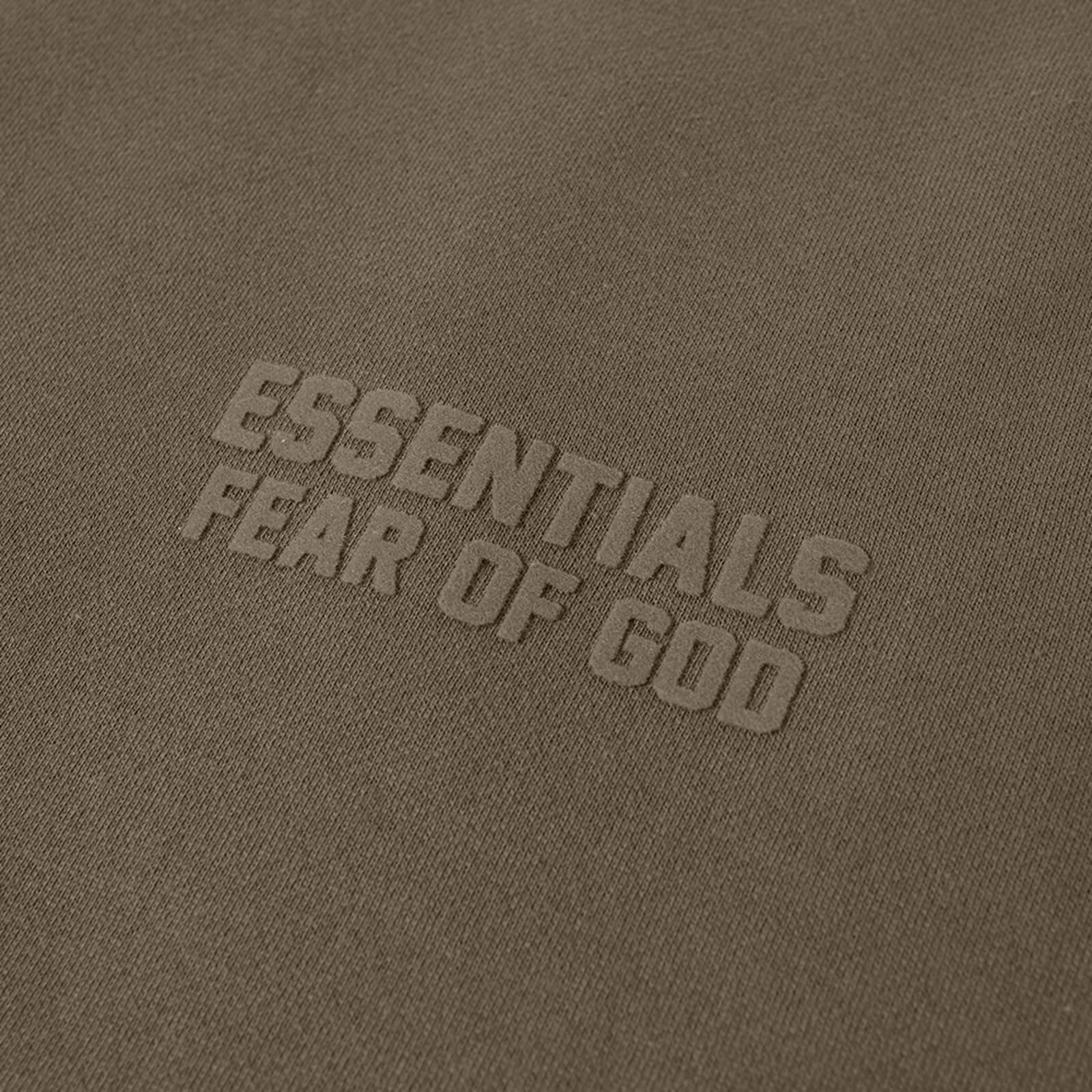 Fear of God ESSENTIALS Logo Crew Neck Sweat Wood END. Fear of God ESSENTIALS Logo Crew Neck Sweat Wood END.