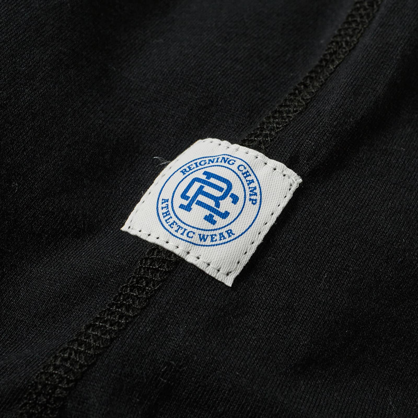 asics reigning champ black