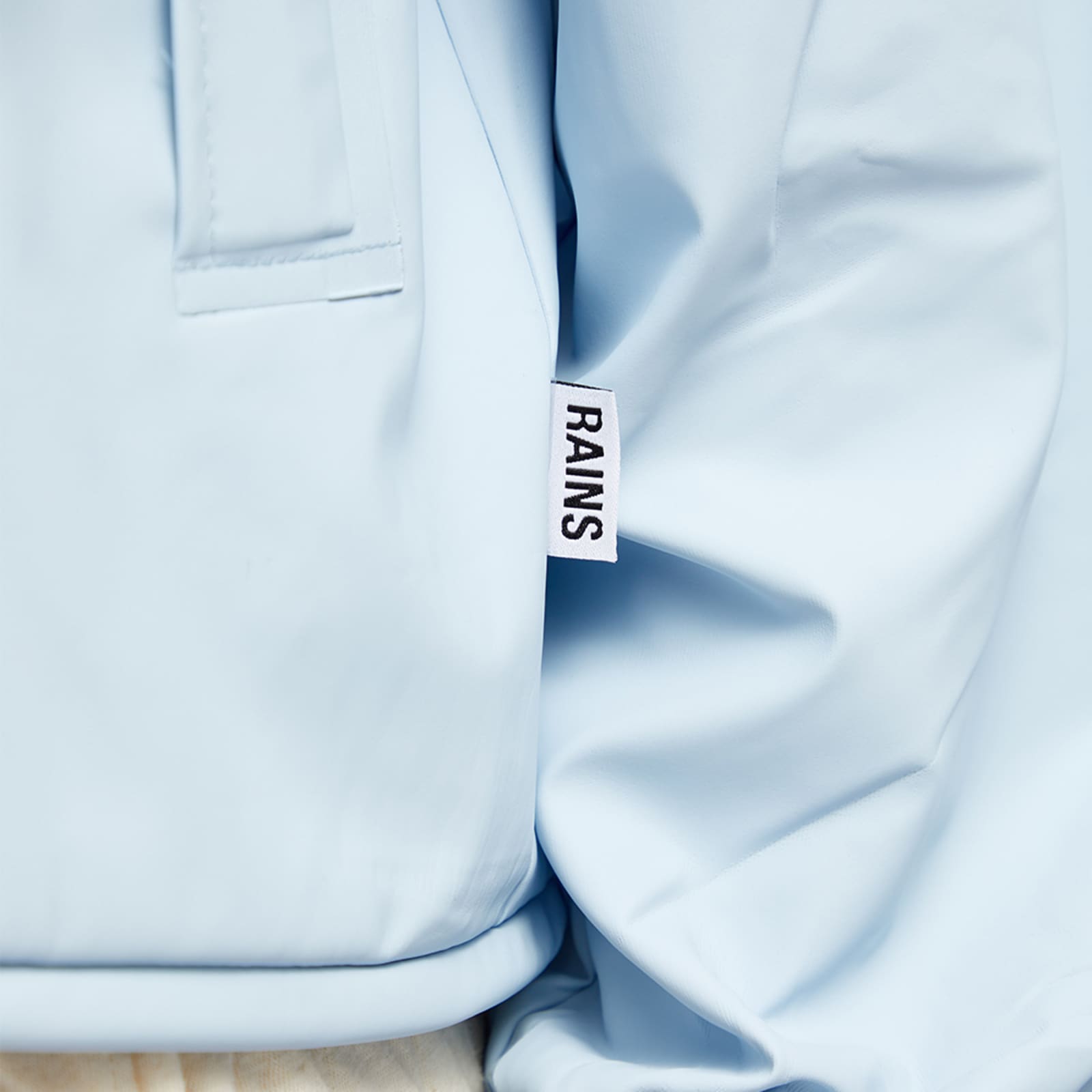 Rains String Rain Jacket Sky END.