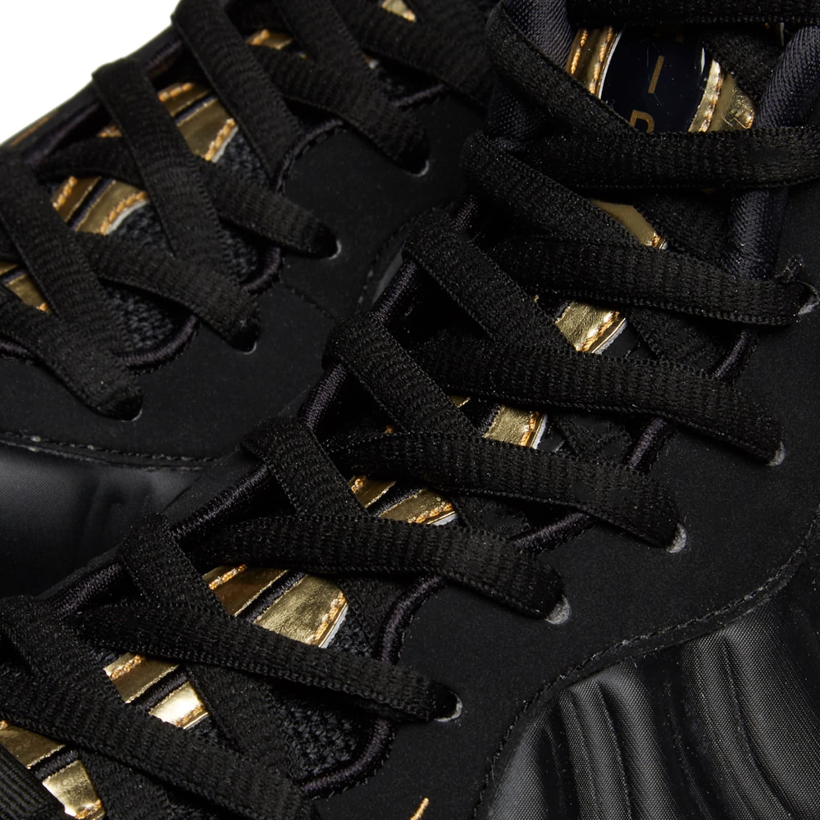 nike air foamposite pro black metallic gold