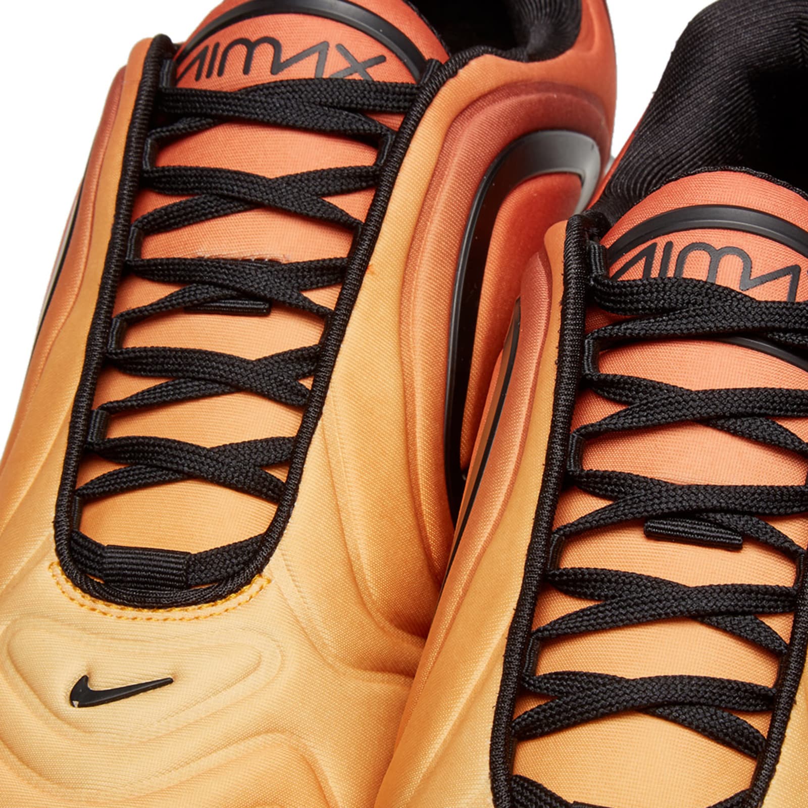 black and orange nike 720