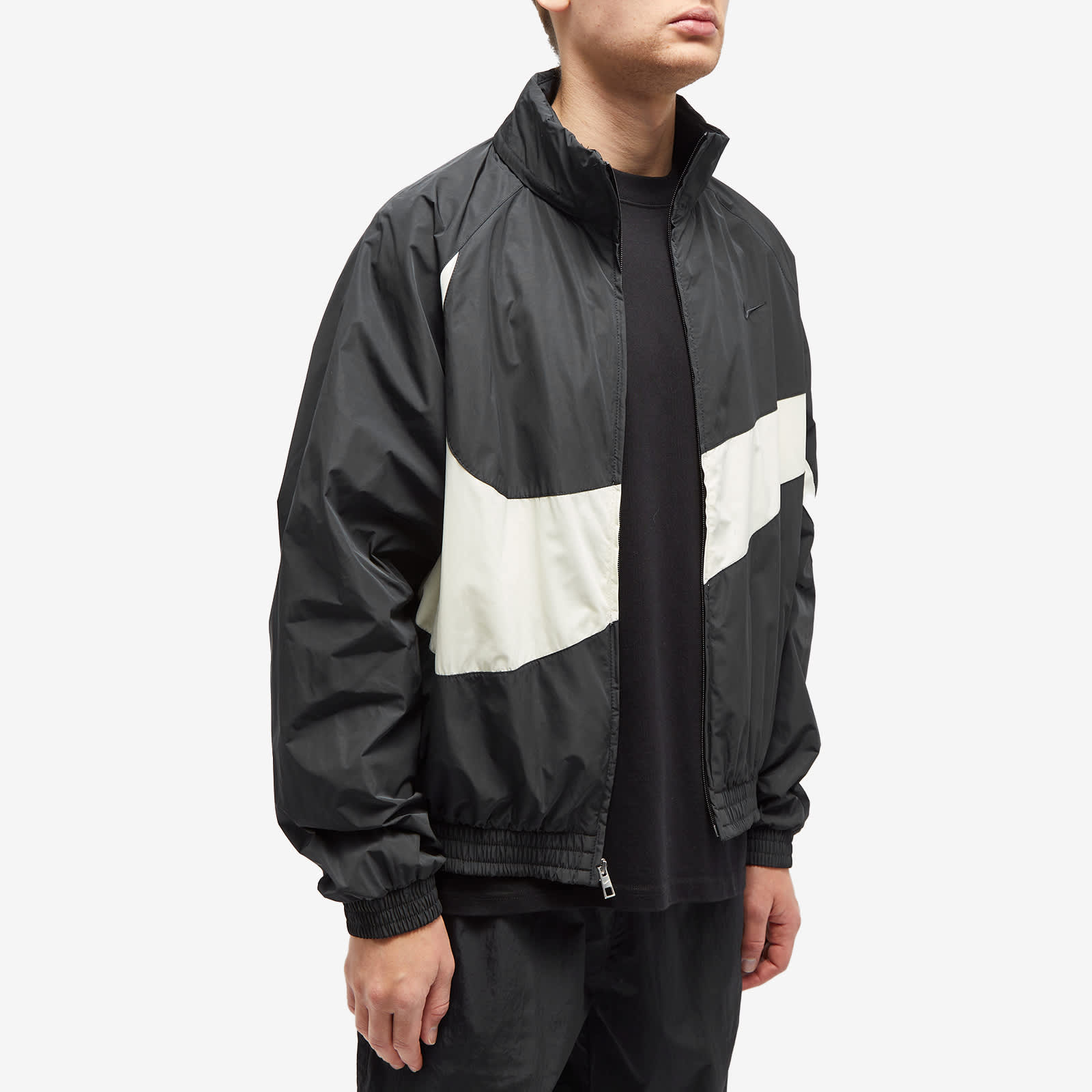 nike woven track jacket in black