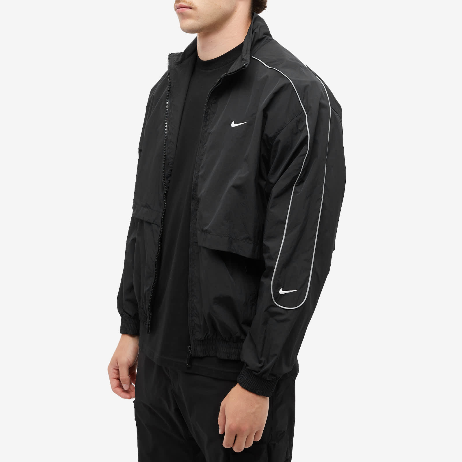 Nike Solo Swoosh Woven Track Jacket Black & White END. (SG) Nike Solo Swoosh Woven Track Jacket Black & White END. (SG)