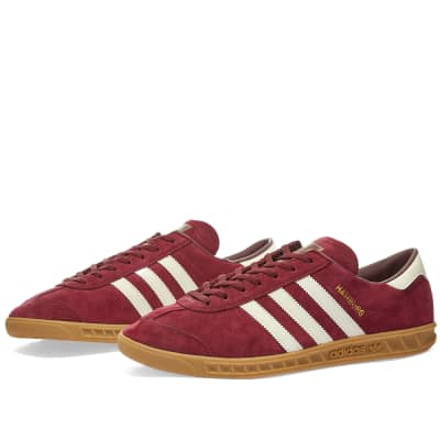 red and black adidas gazelle