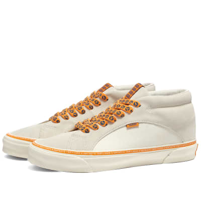 cream coloured vans