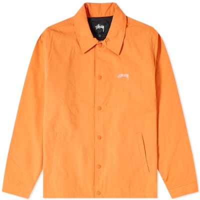 olive green and orange nike shirt