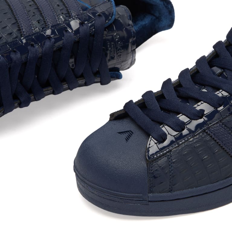 Anthony Edwards x adidas Superstar Navy Croc outsole and profile view