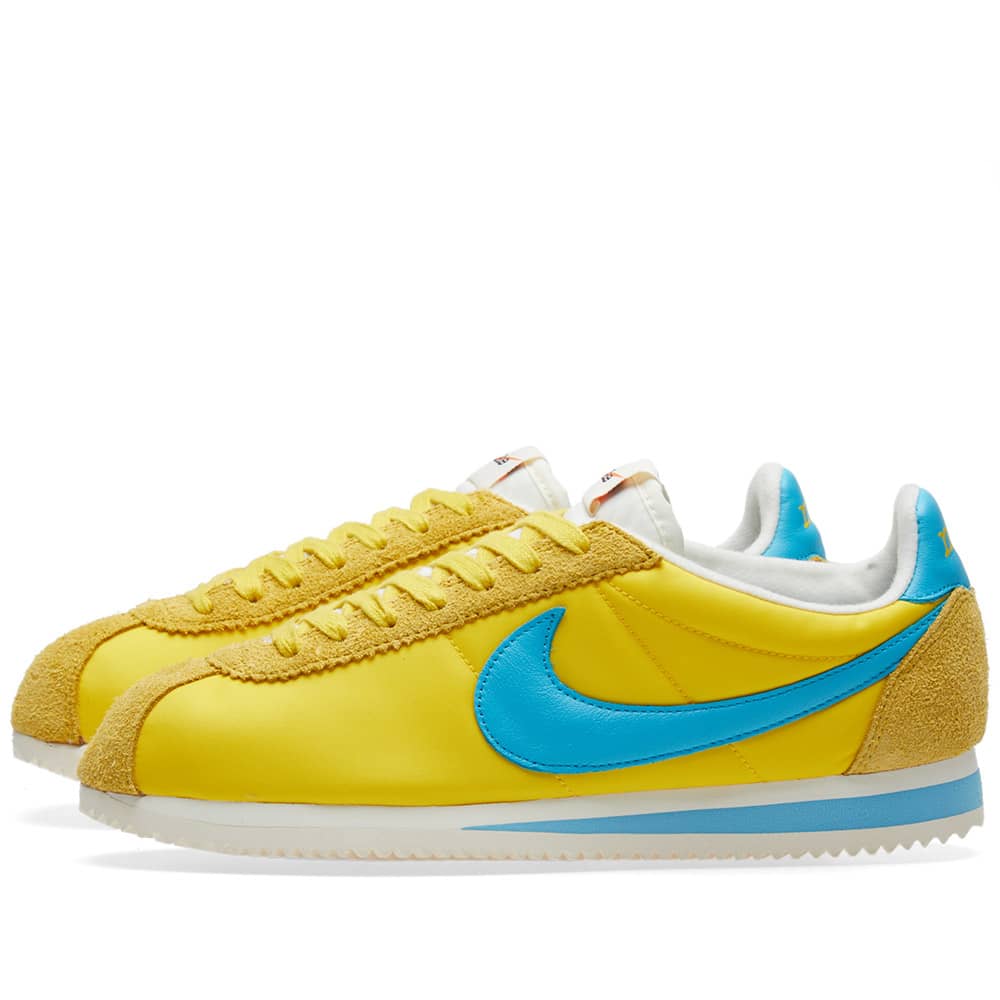 nike cortez yellow and blue