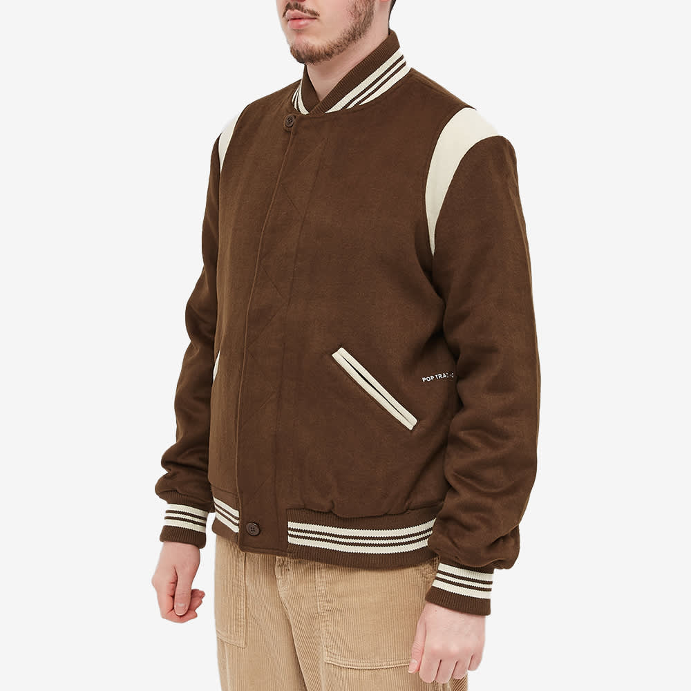 pop-trading-company-wool-varsity-jacket-rain-drum-end-cn