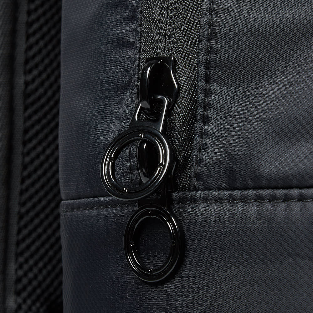 canvas multi pocket backpack
