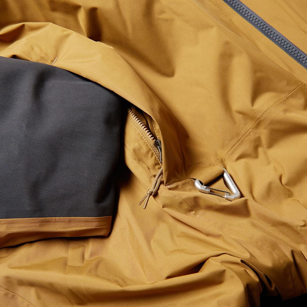 beige nike puffer jacket