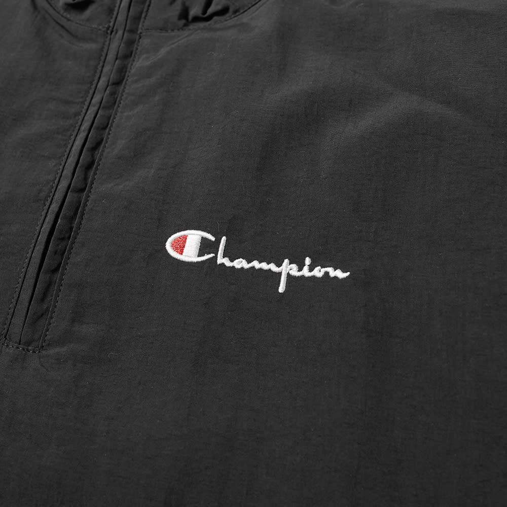 champion half zip track top
