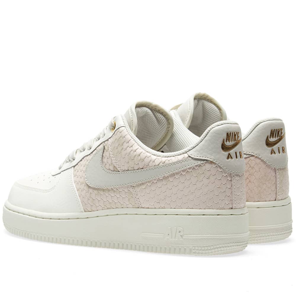 nike air force lv8 gold