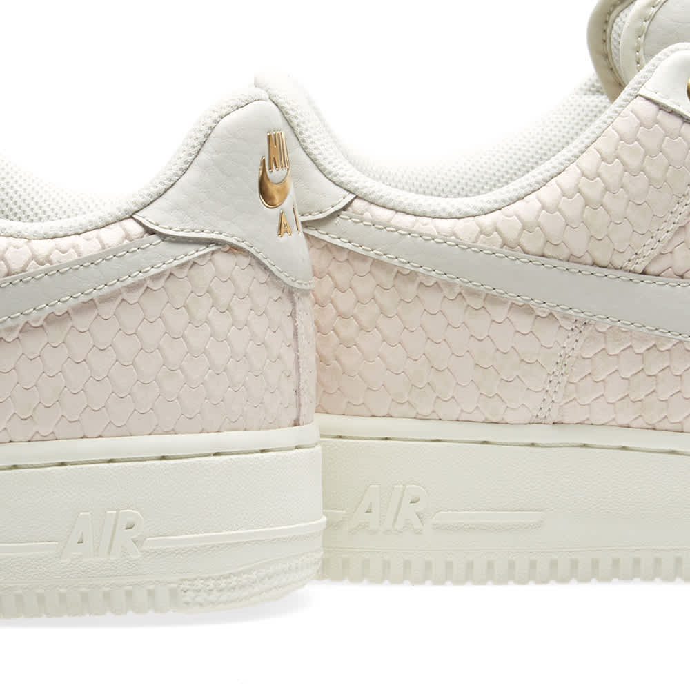 nike air force lv8 gold