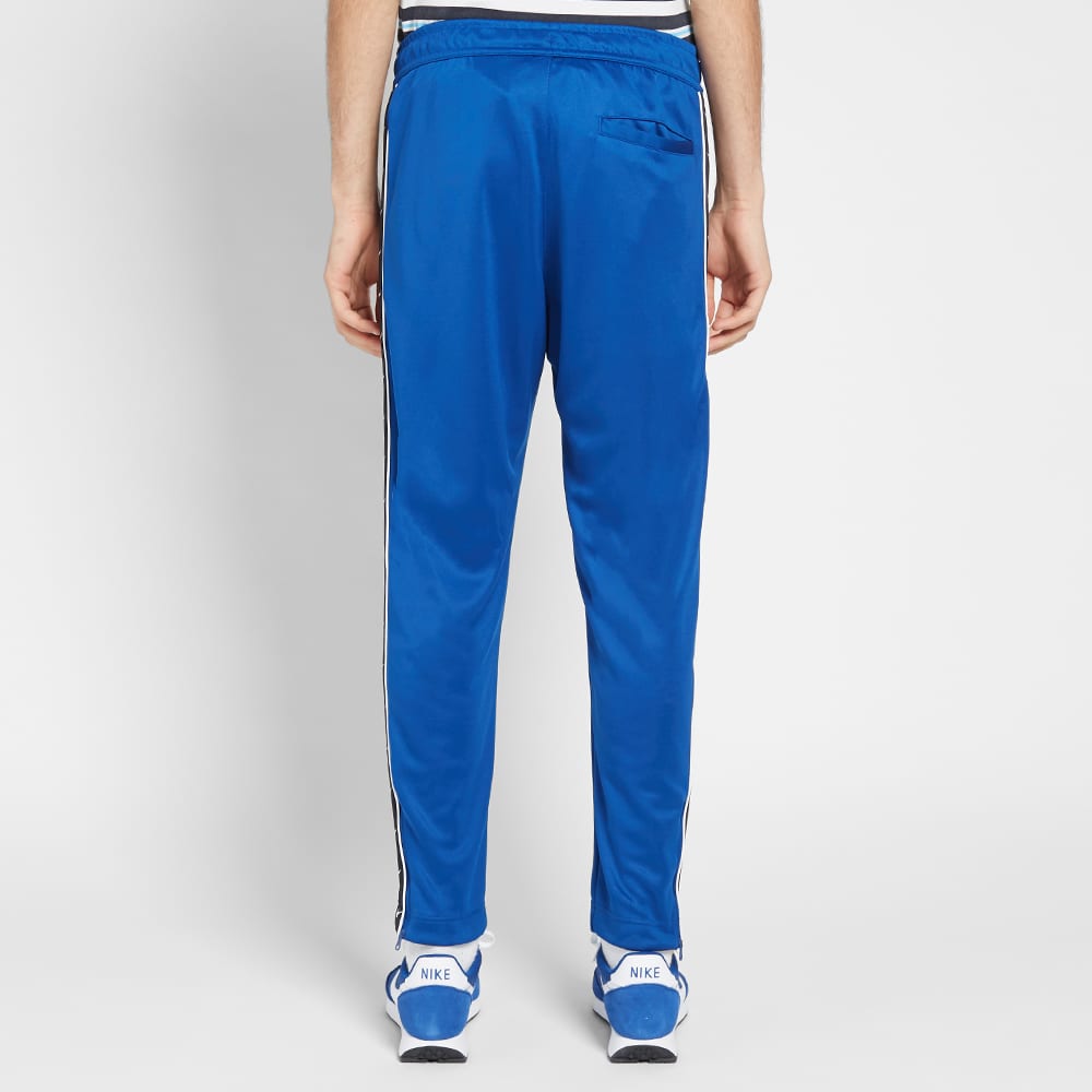 nike taped poly track pants