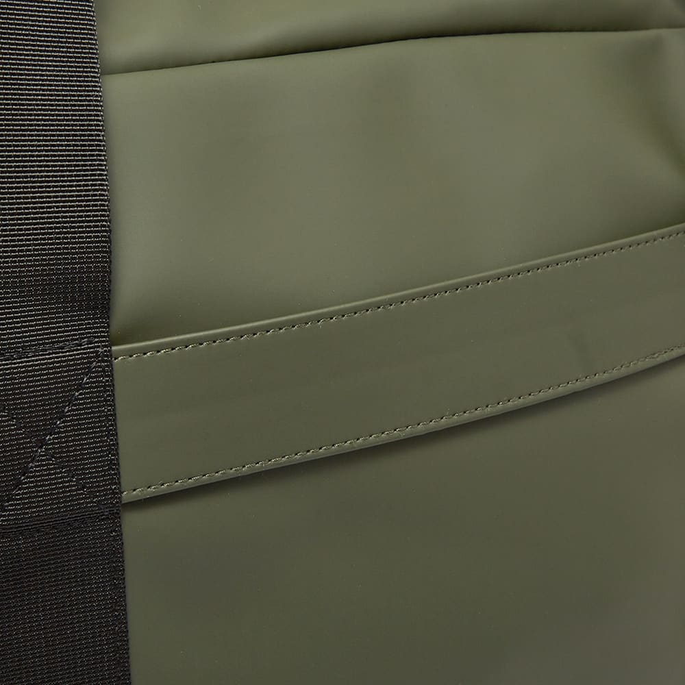 green luggage bag