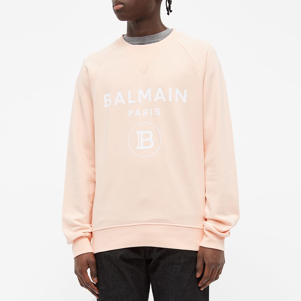 pastel orange sweatshirt