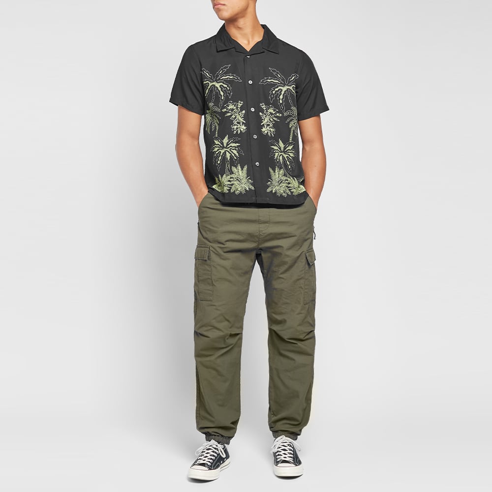 polo shirt and cargo pants