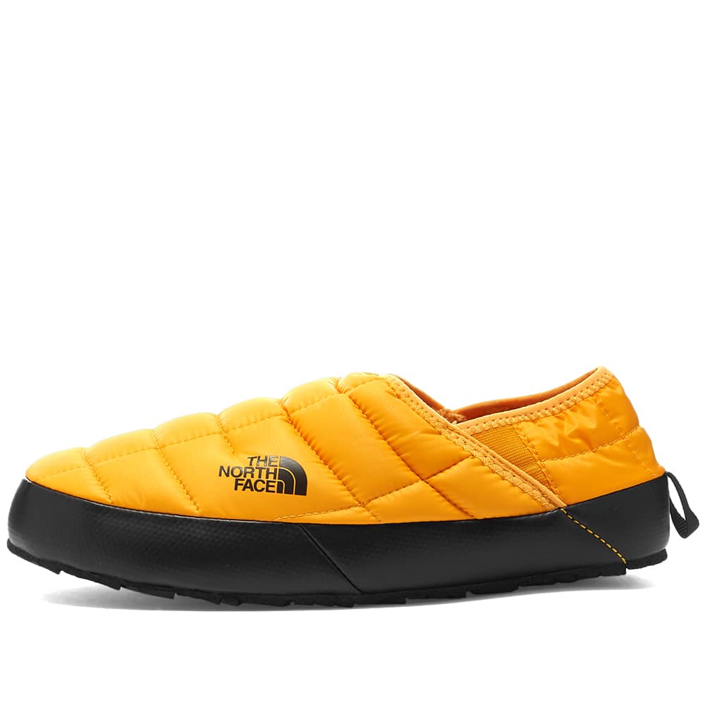 the north face thermoball traction v mule slippers in yellow