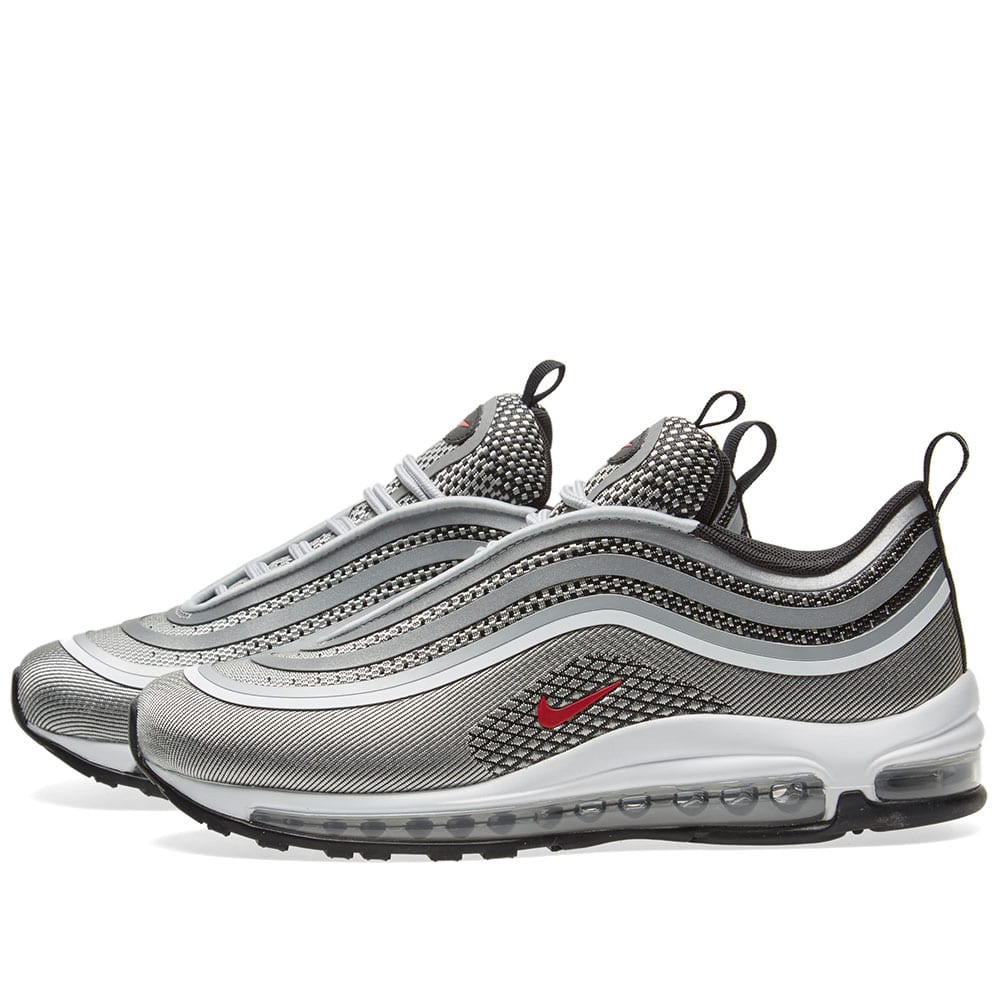 silver and red air max