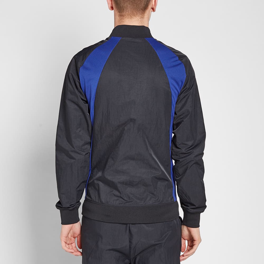 Nike Air Jordan 1 Wings Jacket Black, Royal & University Red END.