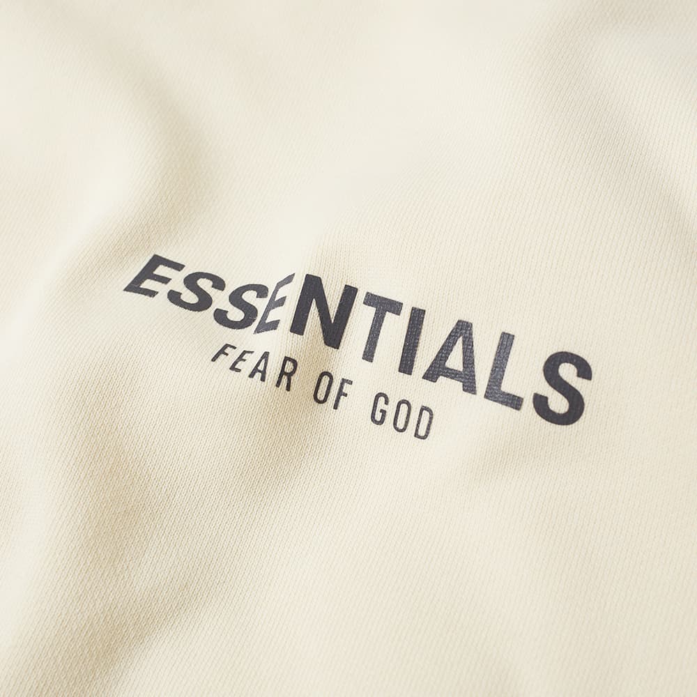 Fear Of God ESSENTIALS Long Sleeve Polo Buttercream | END. (CA)