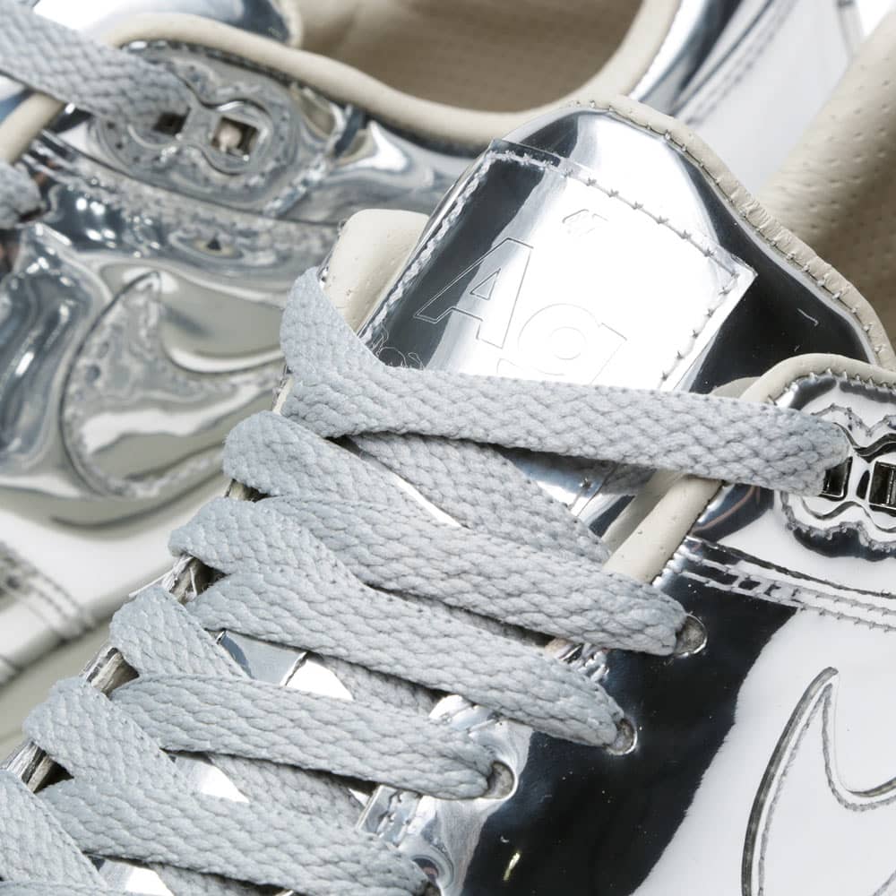 silver nike pros