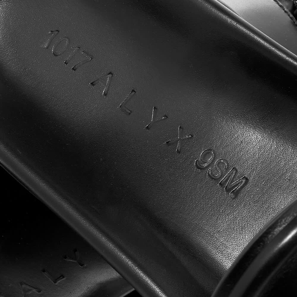 black slides with buckle