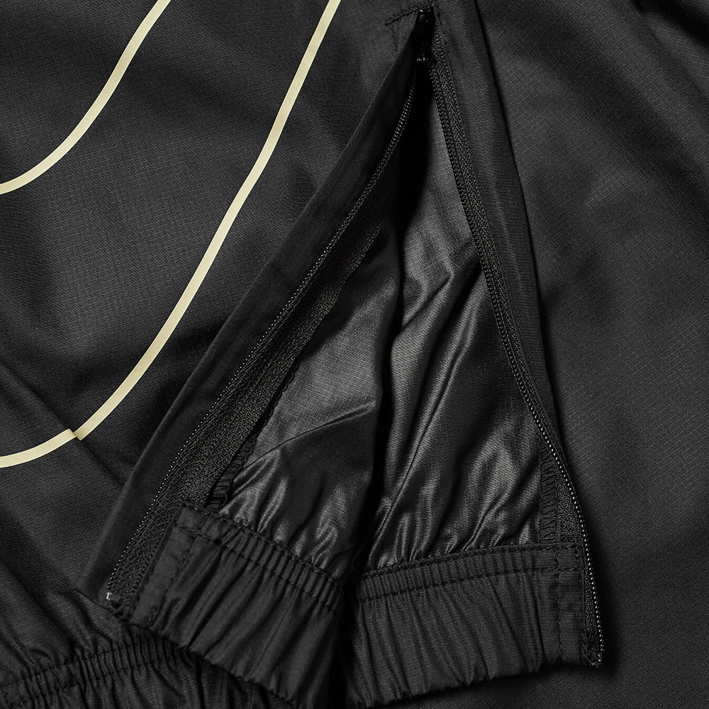 nike fossil & black track pants