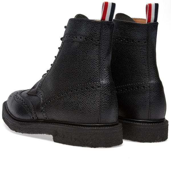 black wingtip boot
