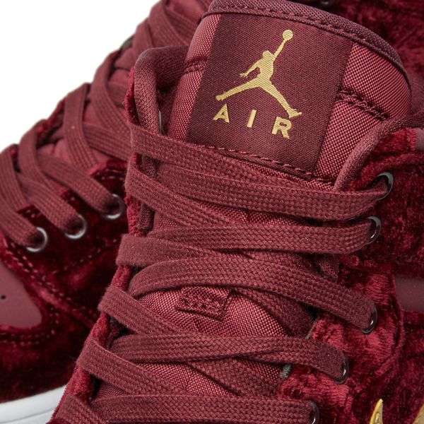 burgundy and gold nike slides
