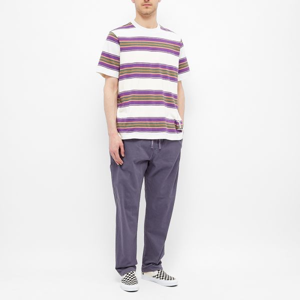 grey pants and purple shirt