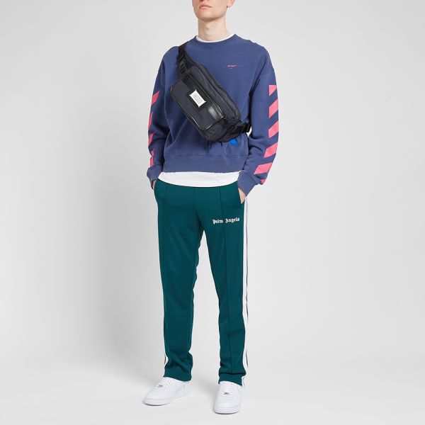dark green track pants