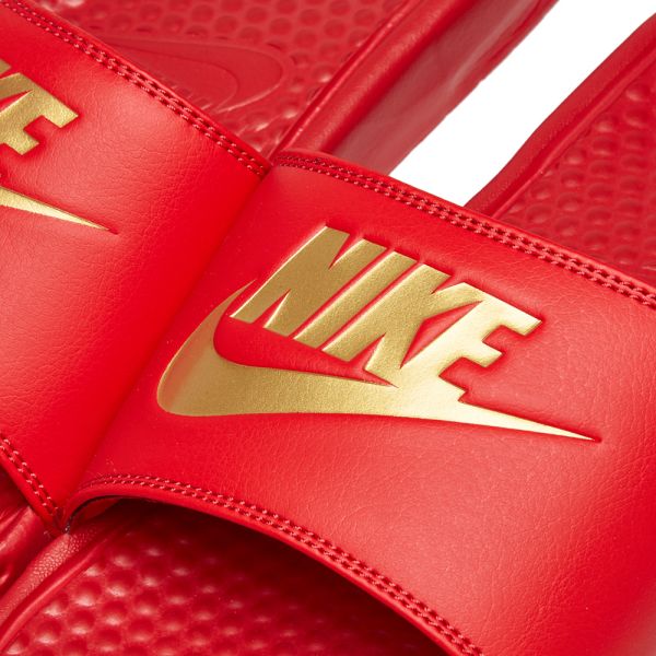 maroon nike slides with gold logo