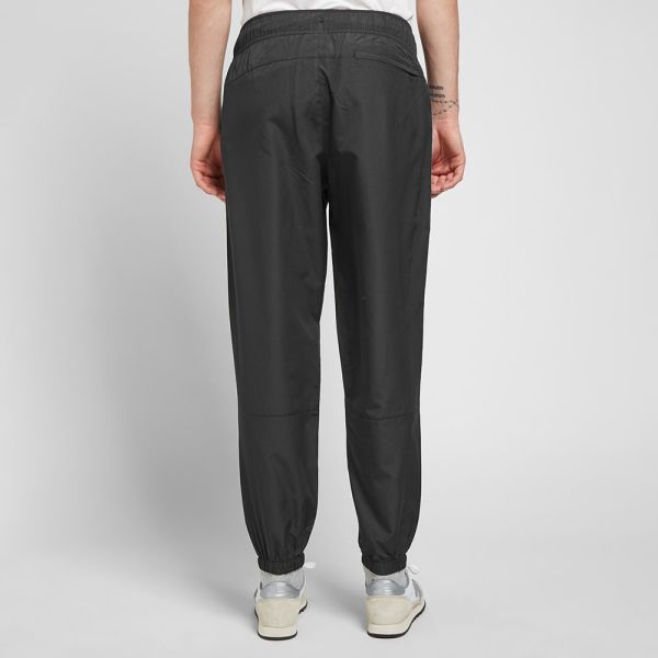 nb athletics windbreaker pant