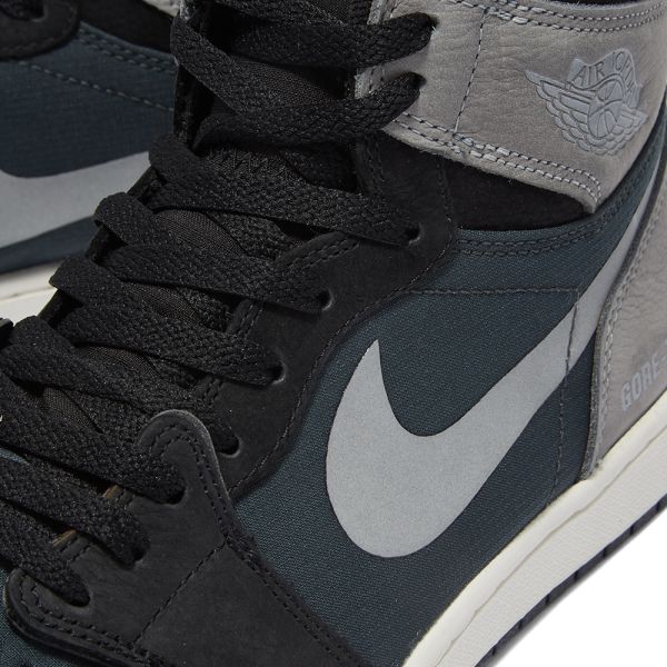 grey and black nike jordans