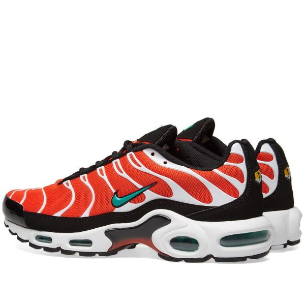 green and orange air max plus