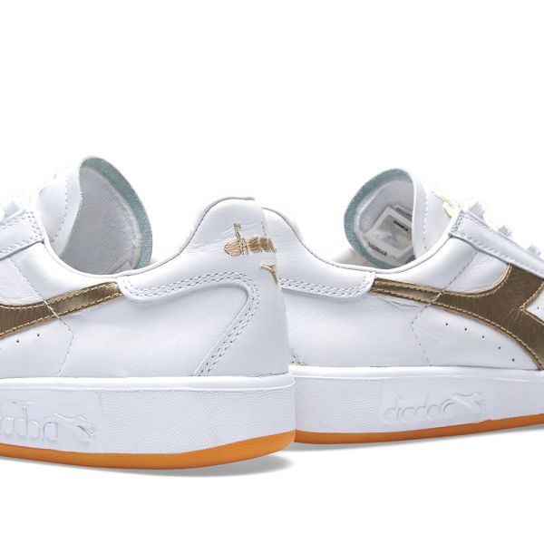 diadora gold stripe trainers