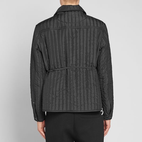 Craig Green Quilted Worker Jacket Black End Grey quilted work jacket from craig green featuring a classic collar, a front button fastening, long sleeves, two front pockets and a straight hem. craig green quilted worker jacket