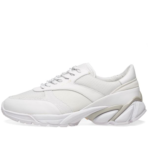 axel arigato tech runner black