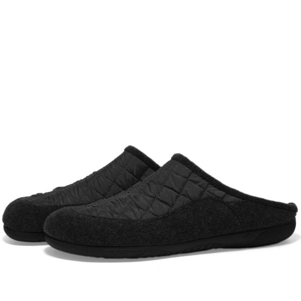black quilted slip ons