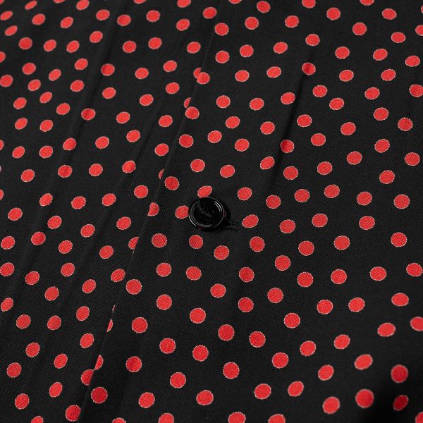 red and black polka dot shirt