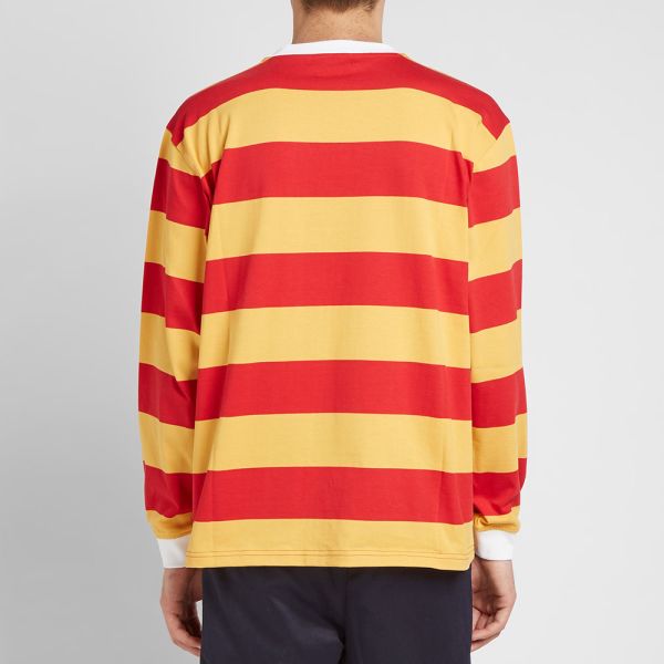 orange and yellow striped long sleeve shirt