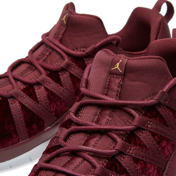 nike maroon and gold slides