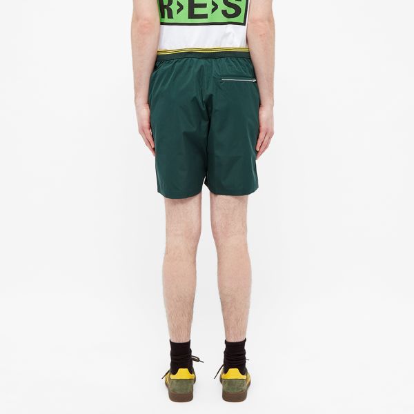 green and white adidas shorts